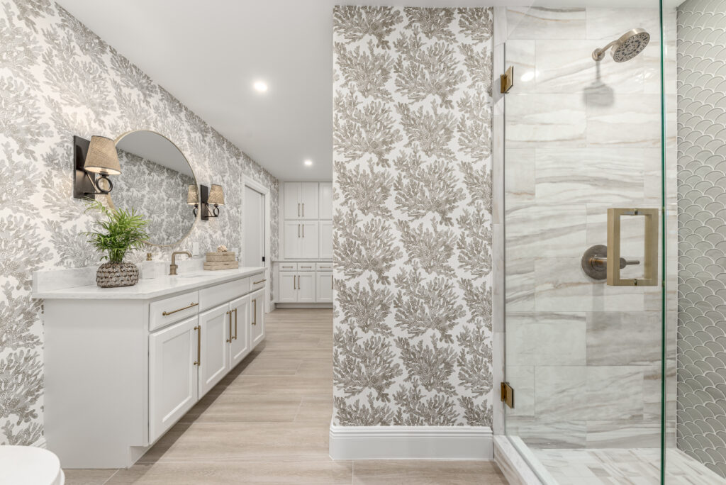 Coral wallpaper in a modern bathroom by Florida Interior Designer Tracie Annase
